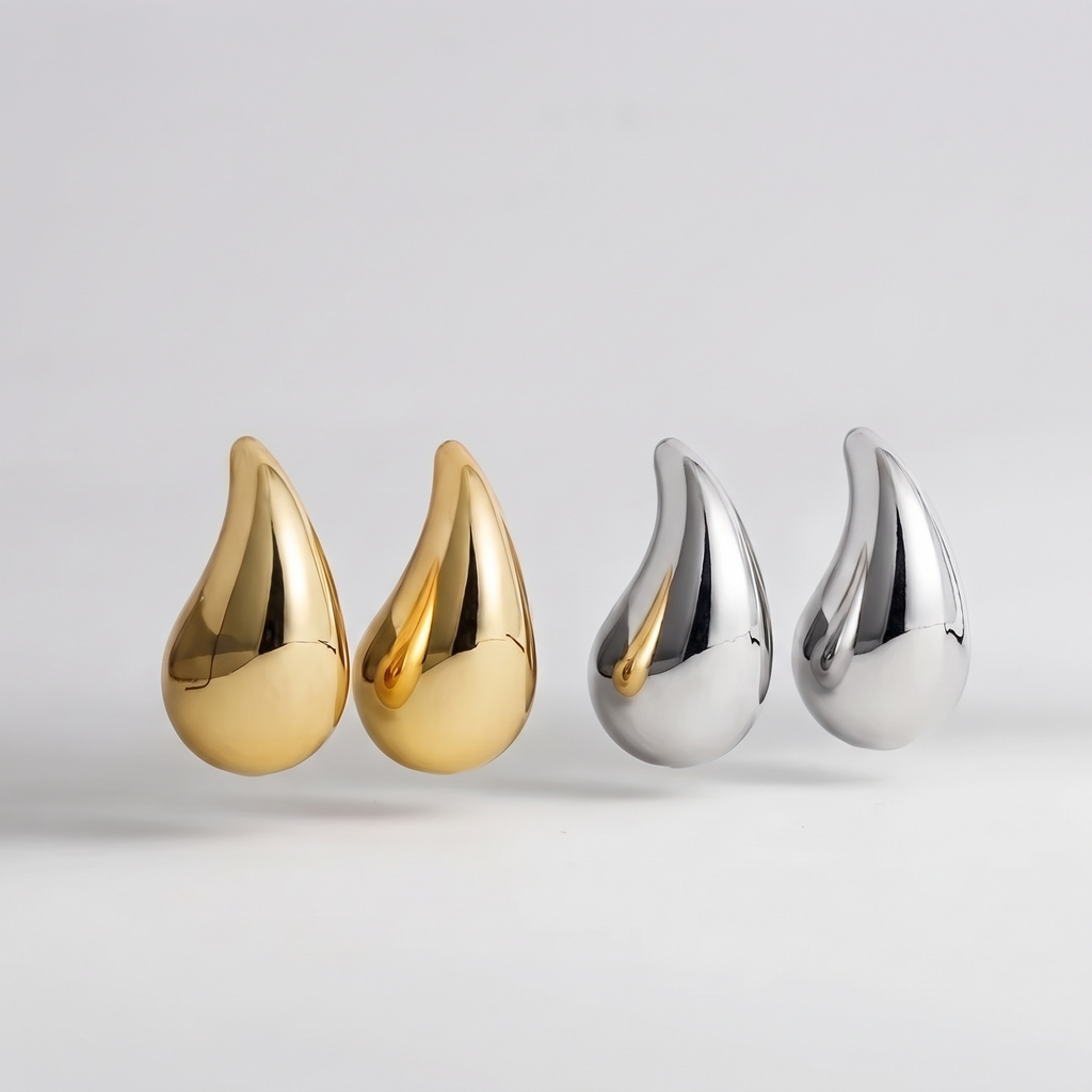 Chunky dome water drop earrings, badge removed