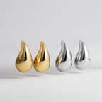 Chunky dome water drop earrings, badge removed