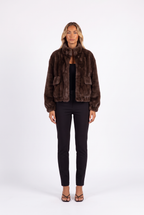Brown plush faux fur cropped bomber jacket — front