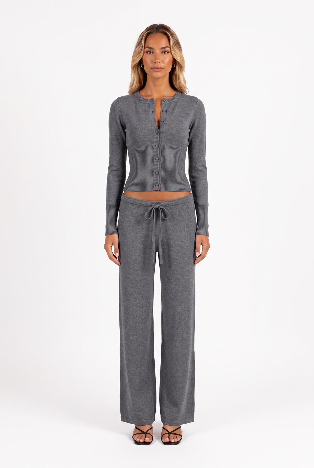 Dark grey knit cardigan and low-rise drawstring trouser set — front