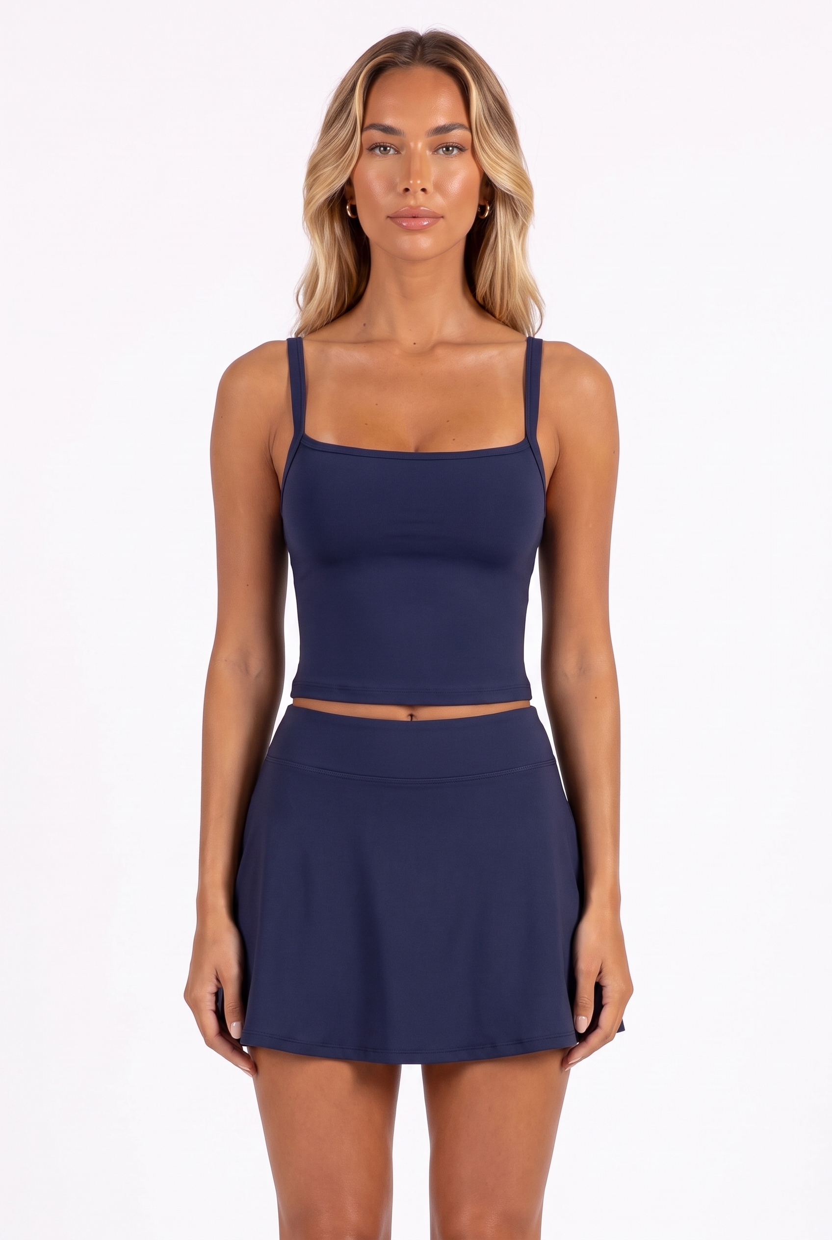Navy square-neck crop top and flared mini skirt set — neckline and waistband detail