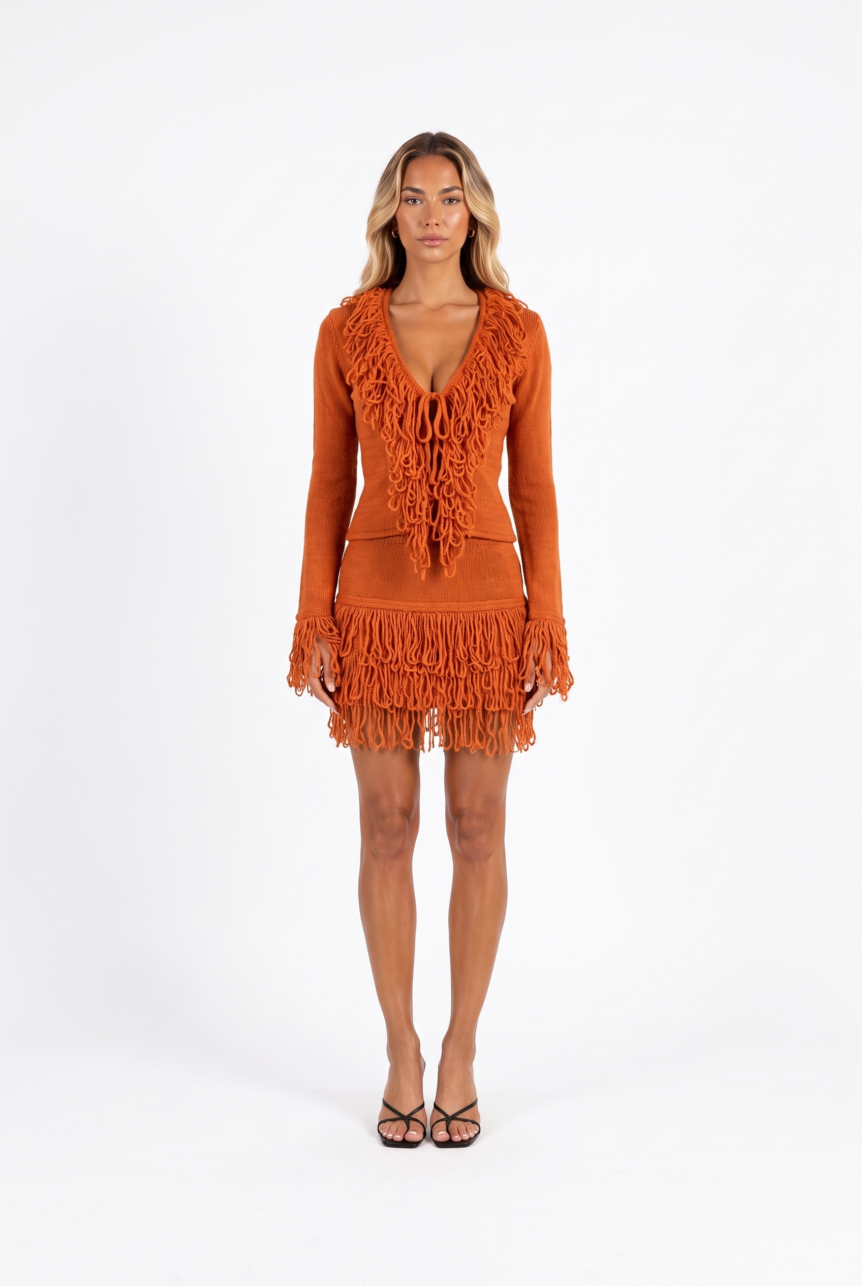 Burnt orange fringe-trim knit top and mini skirt set — front