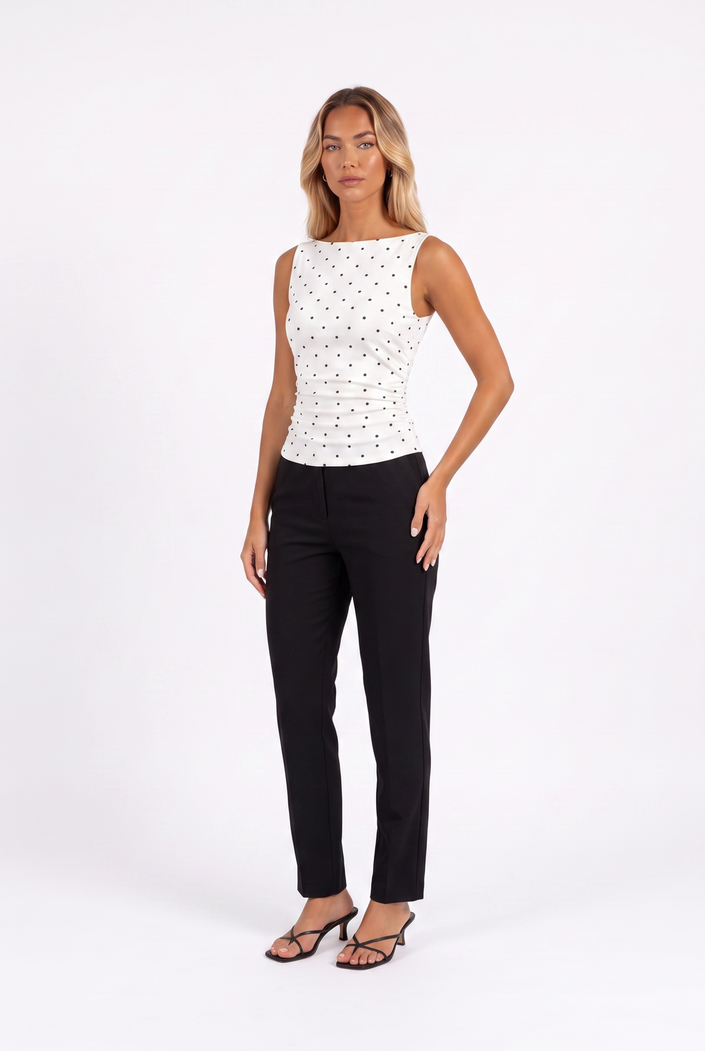 White polka-dot boat-neck sleeveless top with tie back — three-quarter