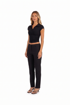 Black polo-collar ruched crop top — three-quarter