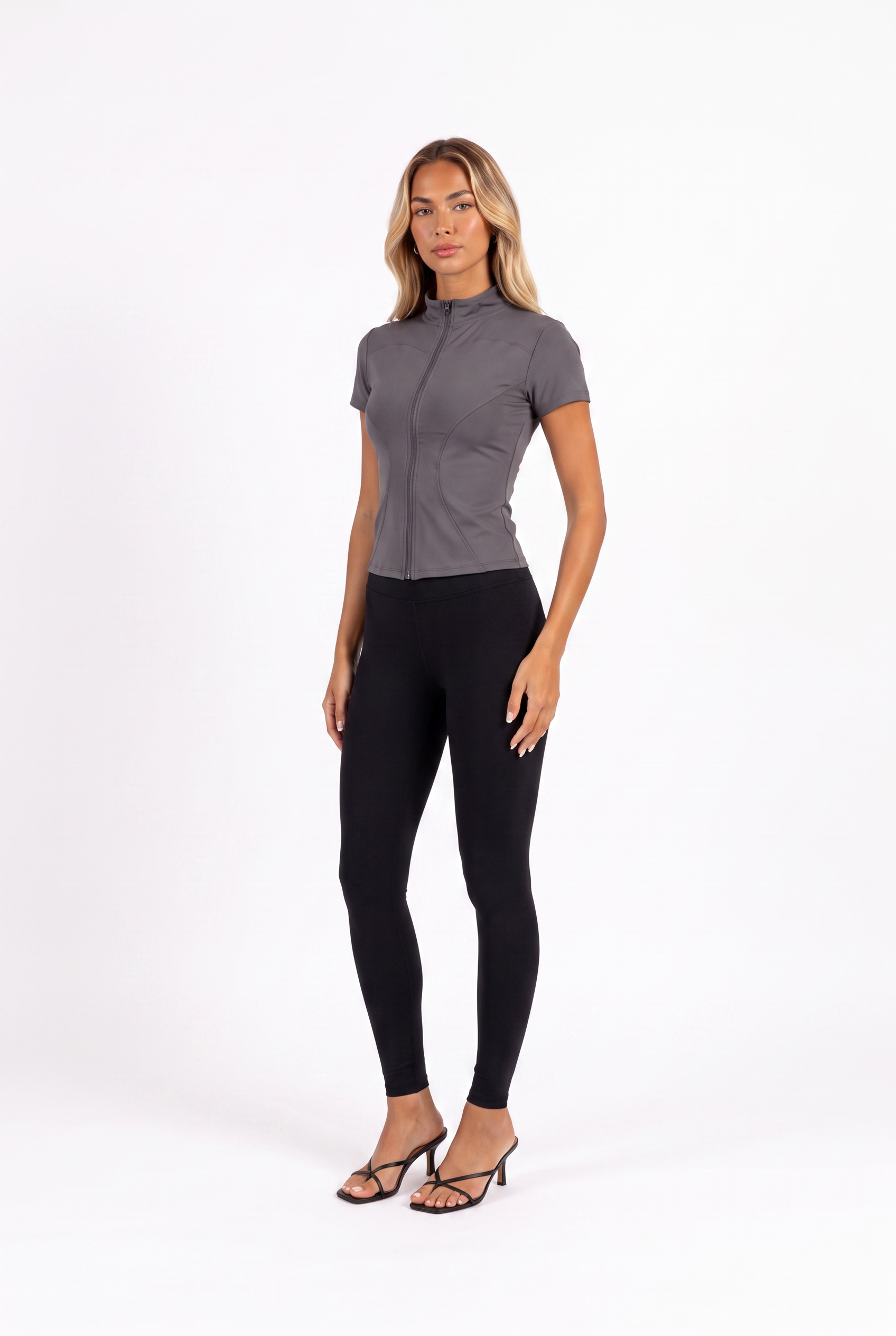Dark grey short-sleeve mock-collar zip athletic top — three-quarter