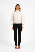 Ivory cropped puffer jacket with ribbed funnel collar — front