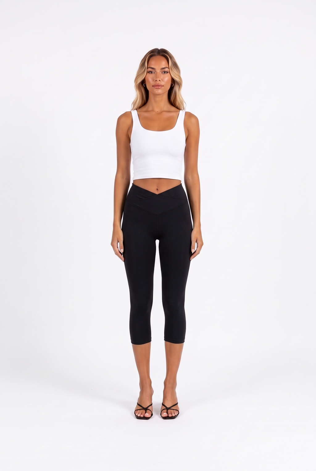 Crossover High-Waist Capri Leggings in black — front